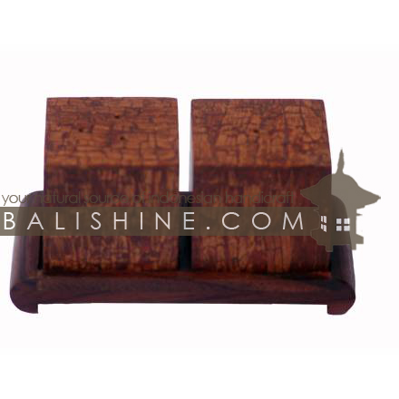 Balishine: Your natural source of indonesian handicraft presents in its Saltcellars & Pepper Pots collection the Saltcellars and Pepper pots:630KAL1160:This set of saltcellars and pepper pots with holder is produced in Bali made from sonokling wood with a natural and parfumed tropical wood known as cinamon. -