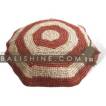balishine This round pillow is produced in Bali it's an handmade rafia with kapok inside.