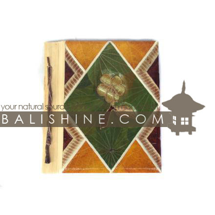 Balishine: Your natural source of indonesian handicraft presents in its Various collection the Photos Album:45BIP18901:This photo album  is produced in Bali made from 7 different  exotic leaf for the cover and 10 pages with recycle paper inside.  Inside maximum 40 photos 15X10 cm.