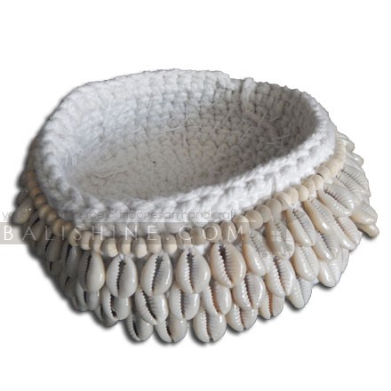 Balishine: Your natural source of indonesian handicraft presents in its Home Decor collection the Crochet Cowrie Shell Basket:12JEN368089:Our beautiful hand made crochet baskets make a beautiful gift or little treat for yourself.  Lovely for keeping bedside to mind your jewellery or also look amazing holding a candle jar.  Our makers hand crochet each basket using cotton thread and then hand stitch each shell on. These are one of our best sellers.  Other size available. Please contact us.