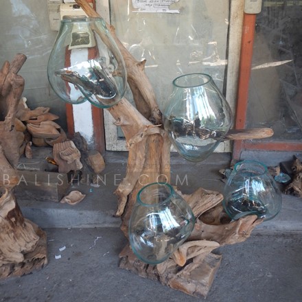 Balishine: Your natural source of indonesian handicraft presents in its Home Decor collection the Handmade Blown Glass 4 Bowls with Teak Wood Stand:12INT878053:This beautiful sculpture is made from handmade blowing glass with teak root base. All pieces are unique and size is for guidance only and may be a little less or more.  This piece include 4 pcs of handmade blowing glass diameter 20-25 cm. 