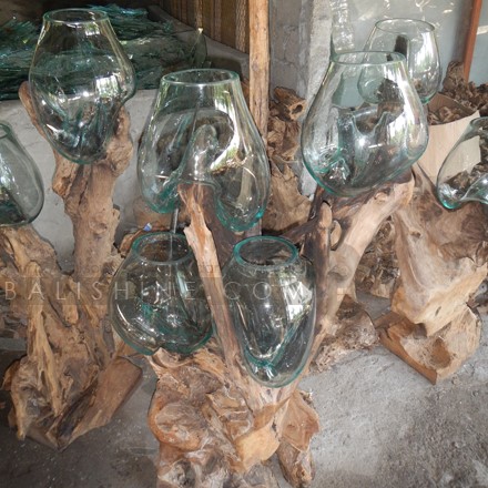 Balishine: Your natural source of indonesian handicraft presents in its Home Decor collection the Handmade Glass 4 Bowls with Teak Wood Stand:12INT878055:This beautiful sculpture is made from handmade blowing glass with teak root base. All pieces are unique and size is for guidance only and may be a little less or more.  This piece include 4 pcs of handmade blowing glass diameter 20-25 cm. 