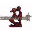 balishine This abstract statue is a handicraft of Bali made from suar wood.