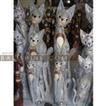 balishine This decorative cat statue is a handicraft of Bali made from albasia wood.