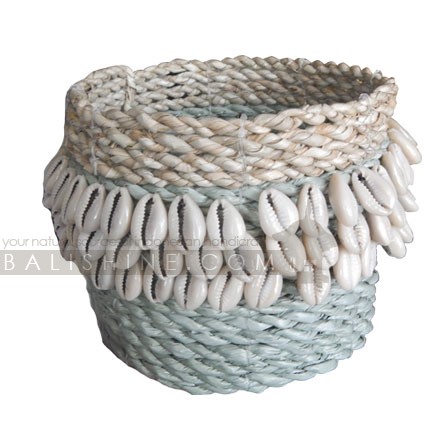 Balishine: Your natural source of indonesian handicraft presents in its Home Decor collection the Shell Trimmed Seagrass Round Basket:12JEN368088:Handwoven natural seagrass baskets?with 3 rows of cowrie shells around the top of each basket. Light green base with natural contrast. Perfect for storage or pot plants covers. Other colors possible please contact us.?  Made from seagrass, ecofriendly and biodegradable.