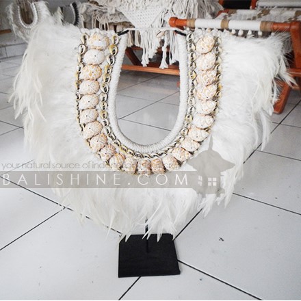 Balishine: Your natural source of indonesian handicraft presents in its Home Decor collection the Tribal Necklace Feather Shell Decorative On Stand:12NUS878001:For ancient Indonesians, jewelry as such was an essential part of ceremonial dress.  Jewelry could be worn as a symbol of power and standing or to protect the wearer from spiritual harm. The shell and feather necklace makes for a spectacular eye-catching home decor piece.  Each necklace is one-of-a-kind and will no doubt make a statement in your home.  This beautifully?crafted necklace?is?handmade in Indonesia.