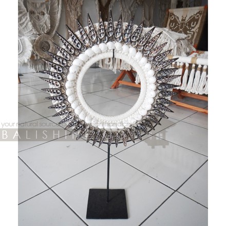 Balishine: Your natural source of indonesian handicraft presents in its Home Decor collection the Tribal Shell Necklace Decorative on Stand:12NUS878006:For ancient Indonesians, jewelry as such was an essential part of ceremonial dress.  Jewelry could be worn as a symbol of power and standing or to protect the wearer from spiritual harm. The shell and feather necklace makes for a spectacular eye-catching home decor piece.  Each necklace is one-of-a-kind and will no doubt make a statement in your home.  This beautifully?crafted necklace?is?handmade in Indonesia.