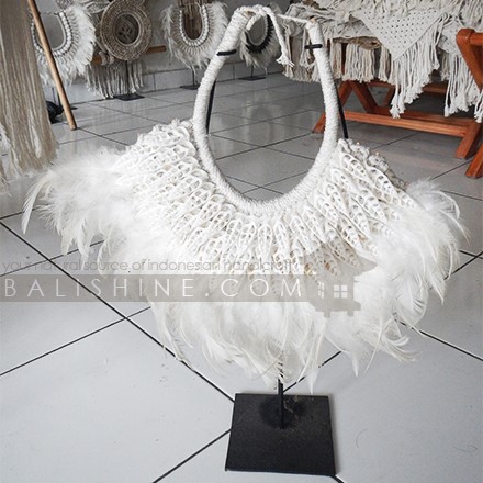 Balishine: Your natural source of indonesian handicraft presents in its Home Decor collection the Ulu Tribal Necklace Feather Shell Decorative on Stand:12NUS878007:For ancient Indonesians, jewelry as such was an essential part of ceremonial dress.  Jewelry could be worn as a symbol of power and standing or to protect the wearer from spiritual harm. The shell and feather necklace makes for a spectacular eye-catching home decor piece.  Each necklace is one-of-a-kind and will no doubt make a statement in your home.  This beautifully?crafted necklace?is?handmade in Indonesia.