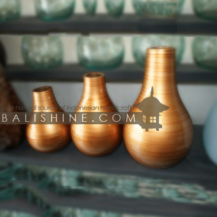 Balishine: Your natural source of indonesian handicraft presents in its Home Decor collection the Glass Vase:12NYG56146:This vase is produced in Bali made from glass with color.  The colors available are gold or silver