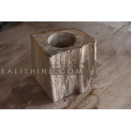 Balishine: Your natural source of indonesian handicraft presents in its Home Decor collection the Candle Holder:13KEL166441:This candle holder is produced in Indonesia made from petrified wood.  