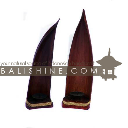 Balishine: Your natural source of indonesian handicraft presents in its Home Decor collection the Candle Holder:13MEB16758:This candle holder is produced in Indonesia made from coconut  wood feet from stainless with a string of pineapple leaf for decoration.  