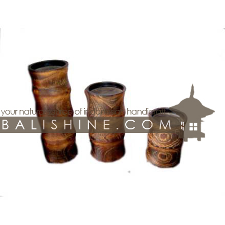 Balishine: Your natural source of indonesian handicraft presents in its Home Decor collection the Candle Holder Set Of 3:13JAS163305:This set of 3 candle holders is produced in Bali made from albasia wood.  Natural color with natural pattern