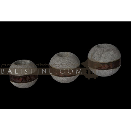 Balishine: Your natural source of indonesian handicraft presents in its Home Decor collection the Candle Holder Set Of 3:13KLG166314:This set of 3 candle holders is produced in Bali and made from natural stone with curved copper finishing.  