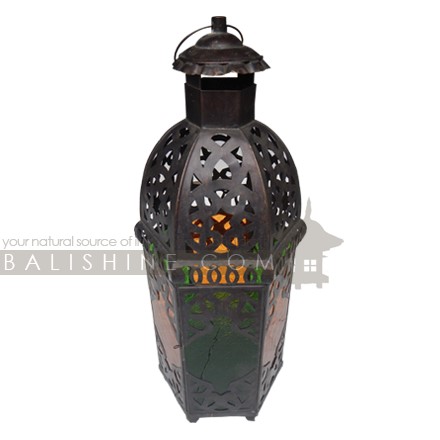 Balishine: Your natural source of indonesian handicraft presents in its Home Decor collection the Aladin Brass Candle Holder:13GET168013:A blue, red, yellow & green handcrafted tin moroccan lamp suitable for tea candles or small pillar candles. Use an oil of citronalla candle for your next BBQ and they will provide you with some Moroccan vibes. A very traditional moroccan style candle lantern. You can also have it wired for electric if you want.  Handcrafted in Bali, Indonesia.
