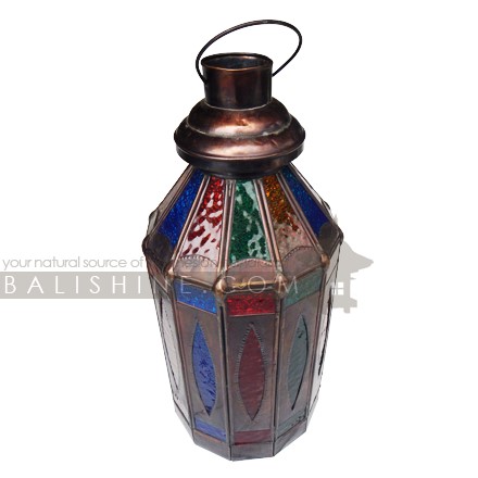 Balishine: Your natural source of indonesian handicraft presents in its Home Decor collection the Marrakech Brass Candle Holder:13GET168014:A blue, red, yellow & green handcrafted tin moroccan lamp suitable for tea candles or small pillar candles. Use an oil of citronalla candle for your next BBQ and they will provide you with some Moroccan vibes. A very traditional moroccan style candle lantern. You can also have it wired for electric if you want.  Handcrafted in Bali, Indonesia.