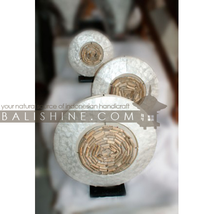Balishine: Your natural source of indonesian handicraft presents in its Home Decor collection the Lamp:13SUN156307:This lamp is produced in Indonesia and made from fiberglass with river wood and shell finishing.  For electric fitting please contact us