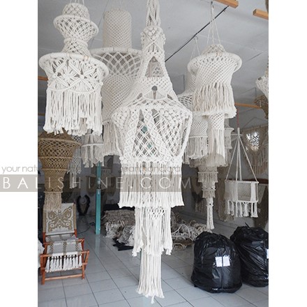 Balishine: Your natural source of indonesian handicraft presents in its Home Decor collection the Paloma Fiber Macrame Lampshade:13NUS867992:A unique macrame chandelier design. With this macrame hanging lamp shade you'll instantly add a bohemian vibe to your room and it will really warm up a space. It is great for a bedroom, living area, boho wedding background or anywhere where you'd like to bring some texture and interest to your walls.  Handmade, natural, 100% cotton. Available in white or light brown color.