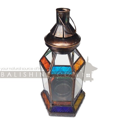 Balishine: Your natural source of indonesian handicraft presents in its Home Decor collection the Rabat Brass Candle Holder:13GET168015:A blue, red, yellow & green handcrafted tin moroccan lamp suitable for tea candles or small pillar candles. Use an oil of citronalla candle for your next BBQ and they will provide you with some Moroccan vibes. A very traditional moroccan style candle lantern. You can also have it wired for electric if you want.  Handcrafted in Bali, Indonesia.