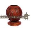 balishine This candle holder is produced in Bali made from coconut wood.