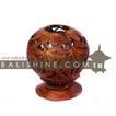 balishine This candle holder is produced in Bali made from coconut wood.