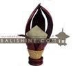 balishine This lamp is produced in Indonesia made from coconut and mahogany wood lampshade from skin of cow with a string of pineapple leaf for decoration.