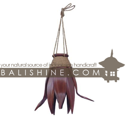 balishine This lampshade is produced in Indonesia made from coconut wood with a string of pineapple leaf for decoration.