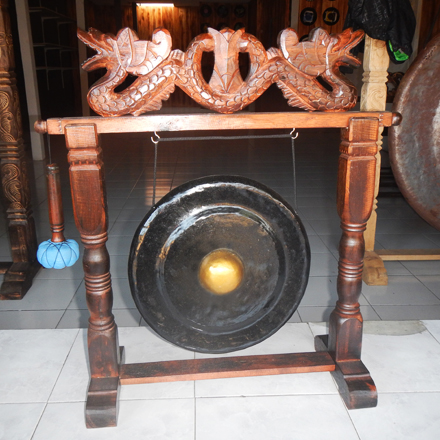 Balishine: Your natural source of indonesian handicraft presents in its Various collection the Decorative Gong:412TOR608285:This decorative gong is a handicraft of Bali made from mahogany wood with brass.  