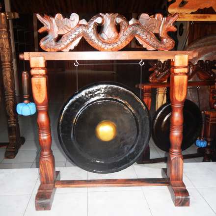 Balishine: Your natural source of indonesian handicraft presents in its Various collection the Decorative Gong:412TOR608287:This decorative gong is a handicraft of Bali made from mahogany wood with brass.  